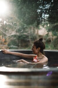 woman in hot tub during daytime