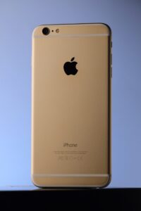 Gold iPhone 6s plus on a blue background