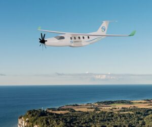 Nine-seat electric aircraft flying above the Danish coastline